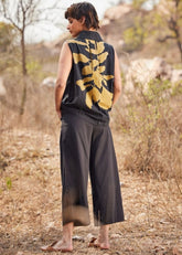 A Model Wearing White Cotton Mul Coturnix Pants,curated by Only Ethikal